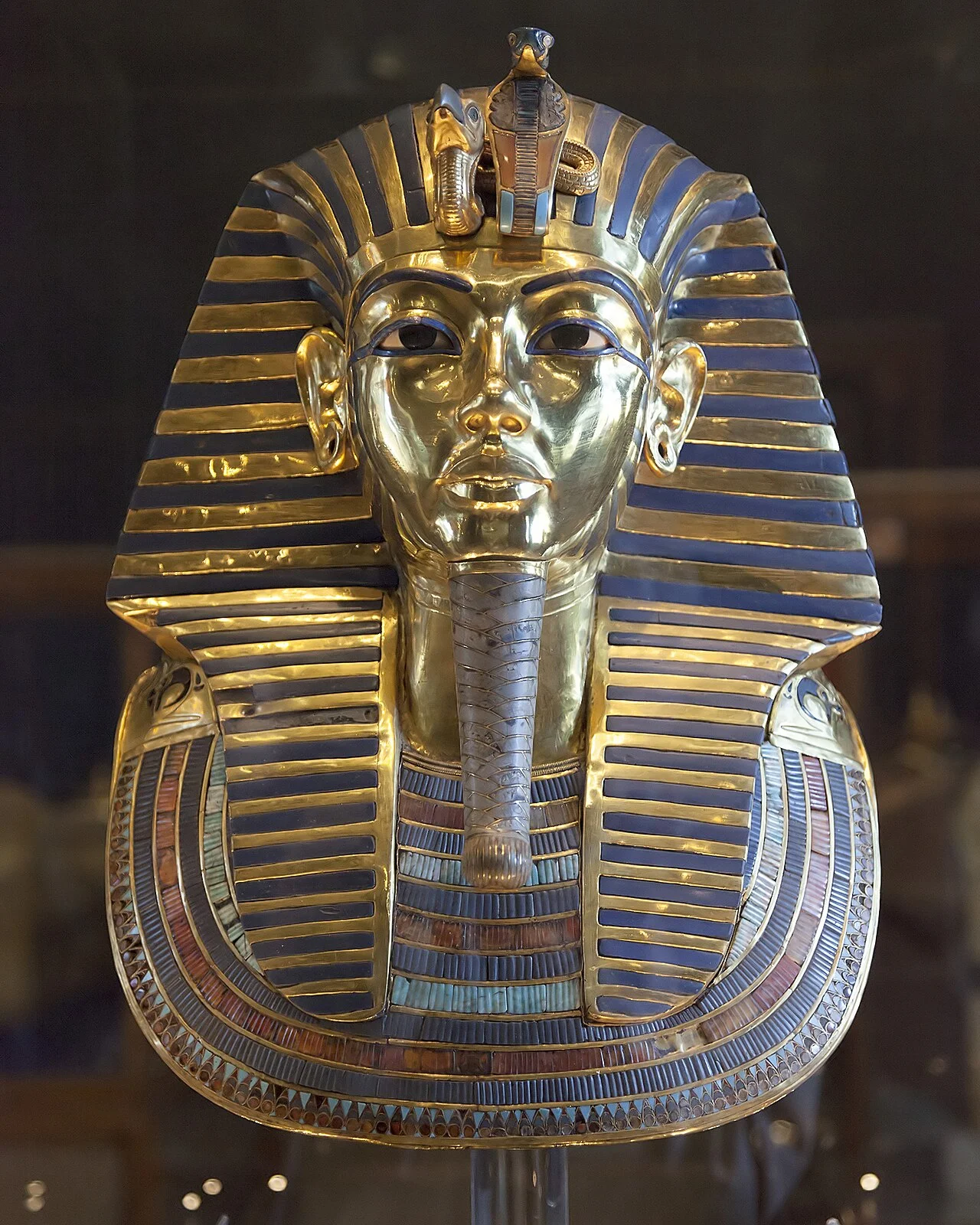 The solid gold funerary mask of Tutankhamun, the most iconic artifact of ancient Egypt, displayed at the Egyptian Museum in Cairo