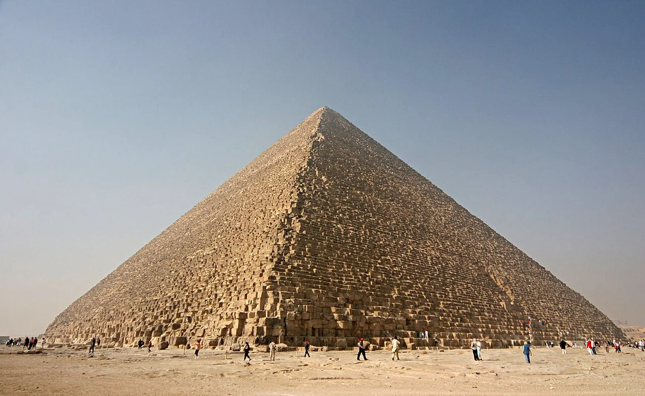 Aerial view of the Giza Pyramid Complex showing the three pyramids and their associated temple complexes